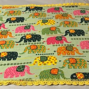 Colorful Elephants on Parade fleece blanket with crochet edges 58” W x 49”